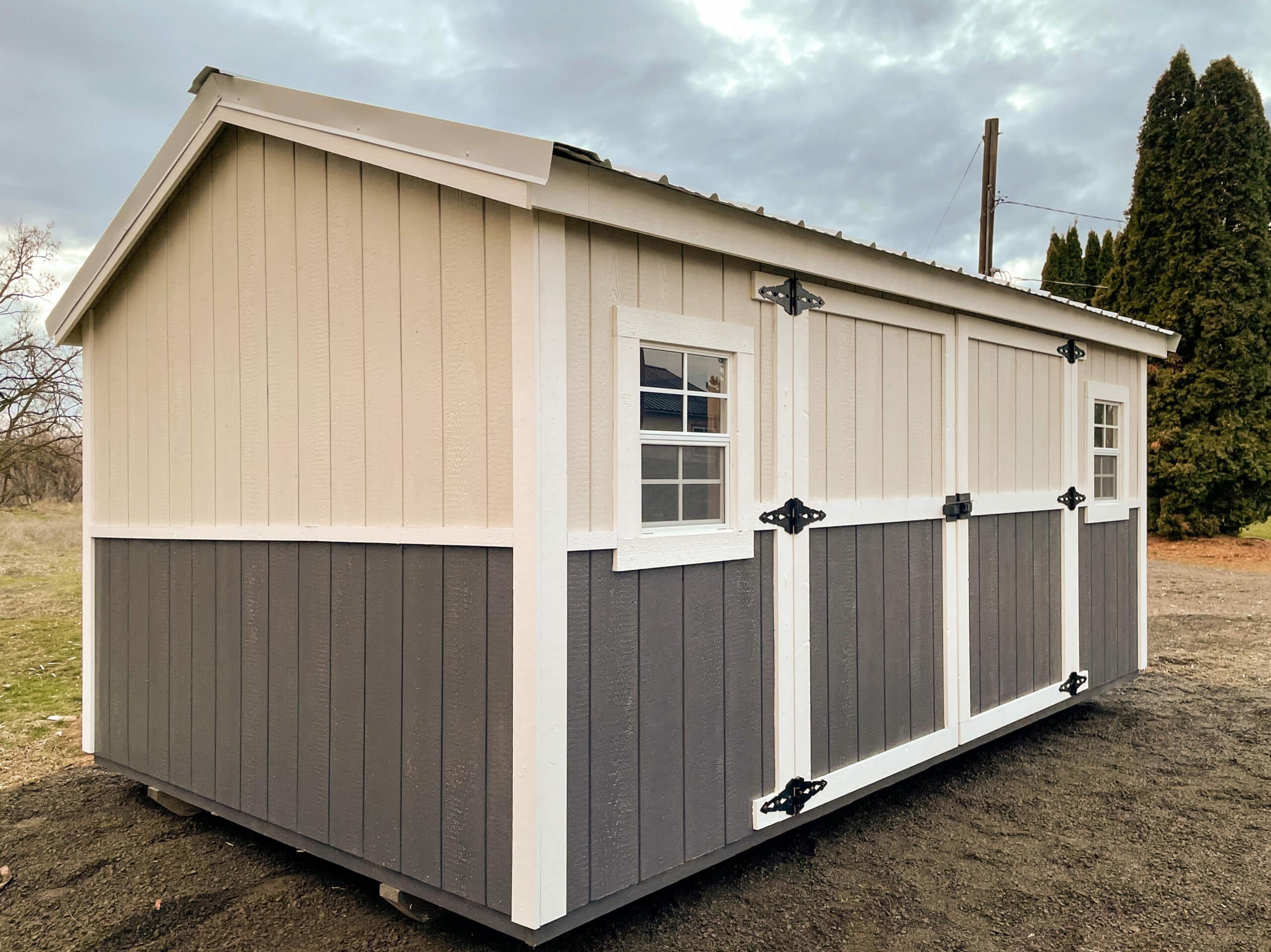 tan and gray storage sheds in oregon with white trim